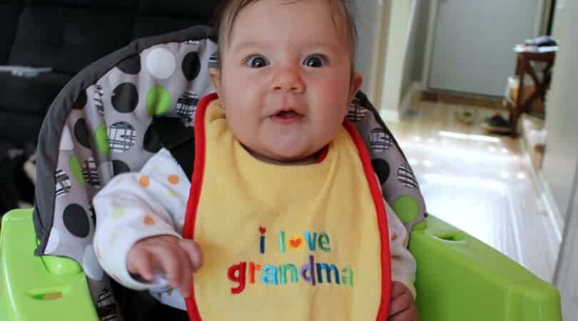 GIVING SOLID FOODS The progression of feeding solid foods to your baby. Starting at 4 to 6 months with purees, and working up to bite sized pieces by 7 months.