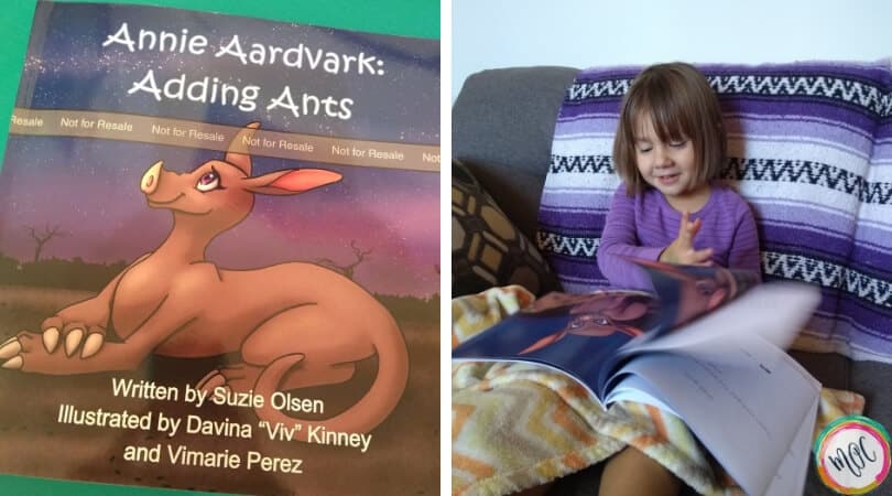 Annie Aardvark: Adding Ants book cover. Our daughter Caroline is flipping through the pages enjoying her STEM reading experience.