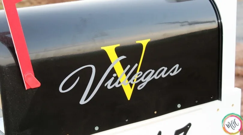 mailbox decal with Villegas written and yellow V