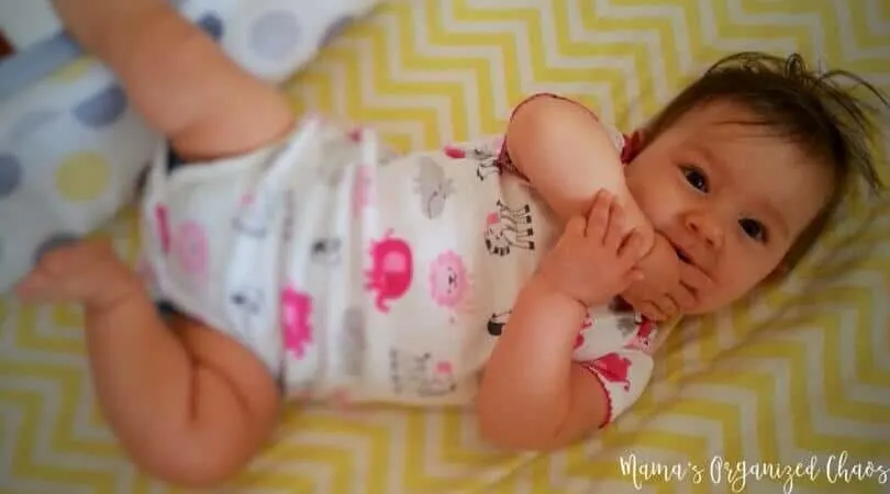Sample Baby and Toddler Schedules Baby lying in crib after taking a nap from one of her babywise schedules