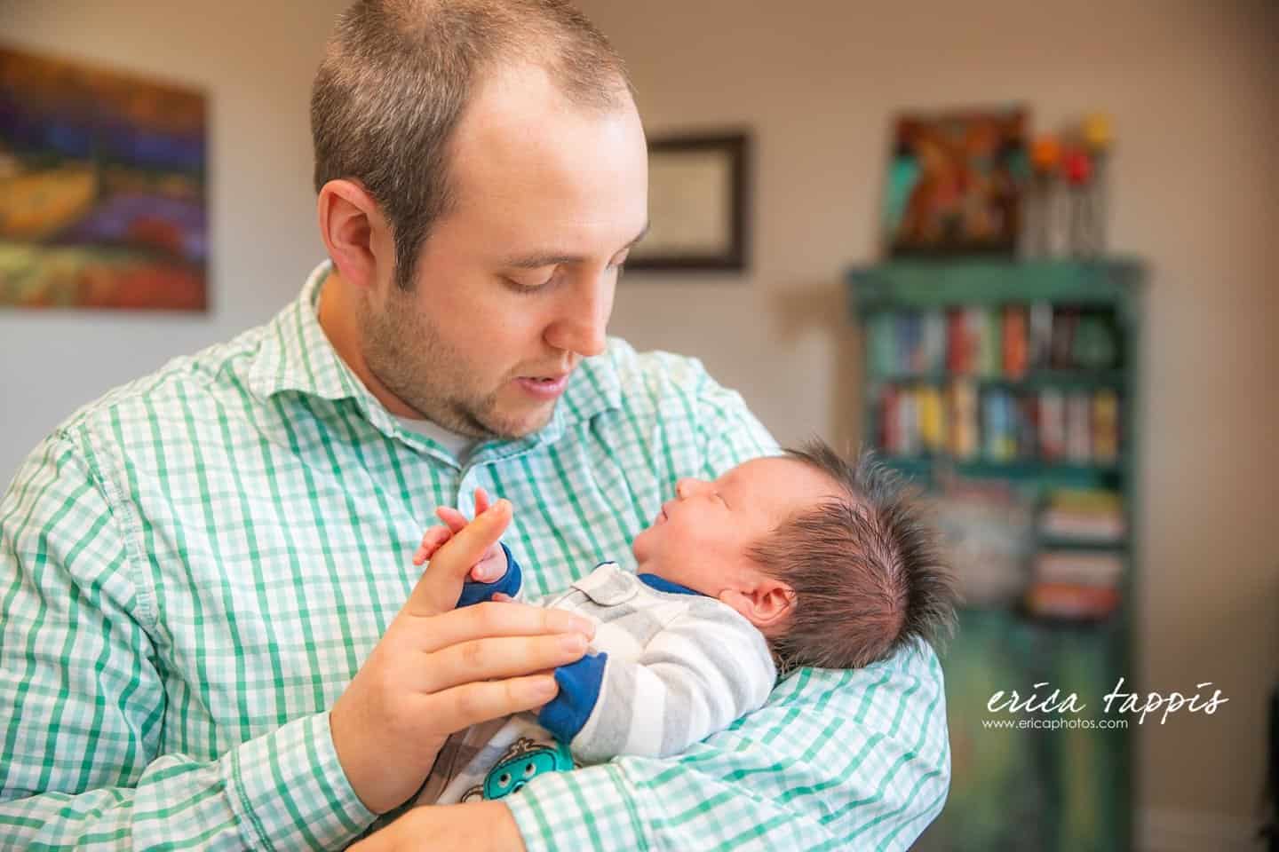 dad holding baby