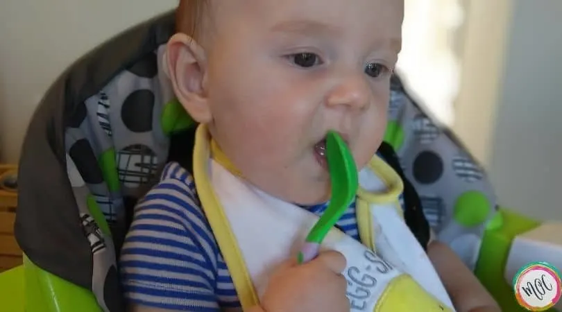 William’s 6 Month Old Schedule 6 month old licking a spoon